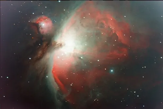 The Orion Nebula, Messier 42, with red and green structure around the bright core